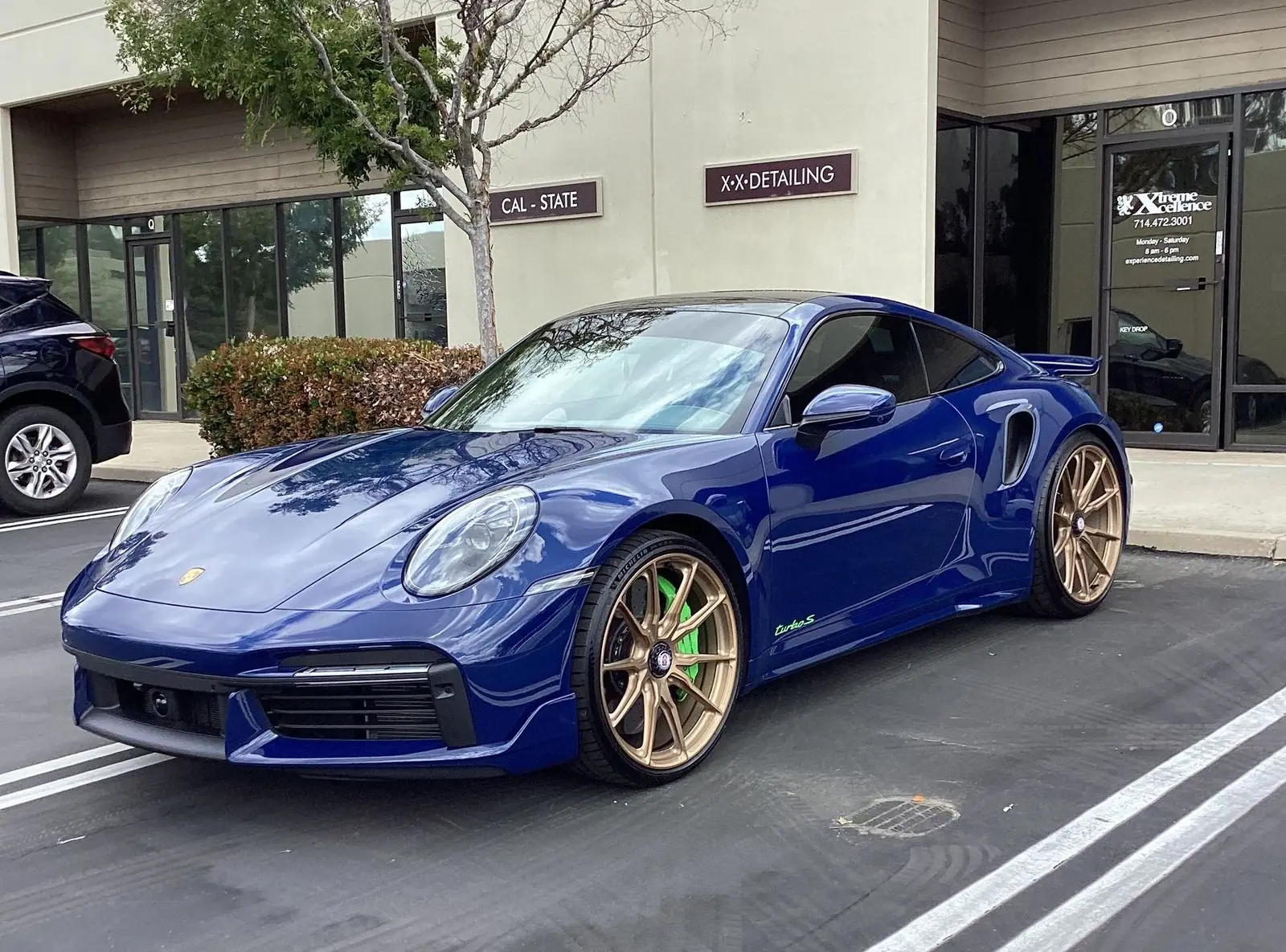 Blue Porsche 911 with a corrected, high-gloss finish
