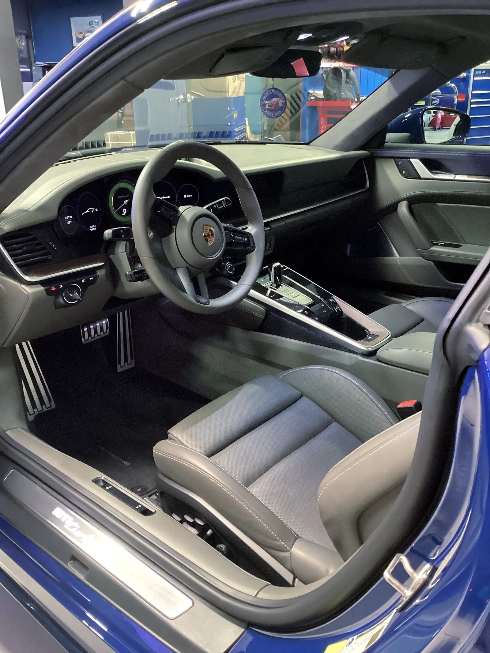 Grey leather cabin of a Porsche 911 Turbo S after interior detailing