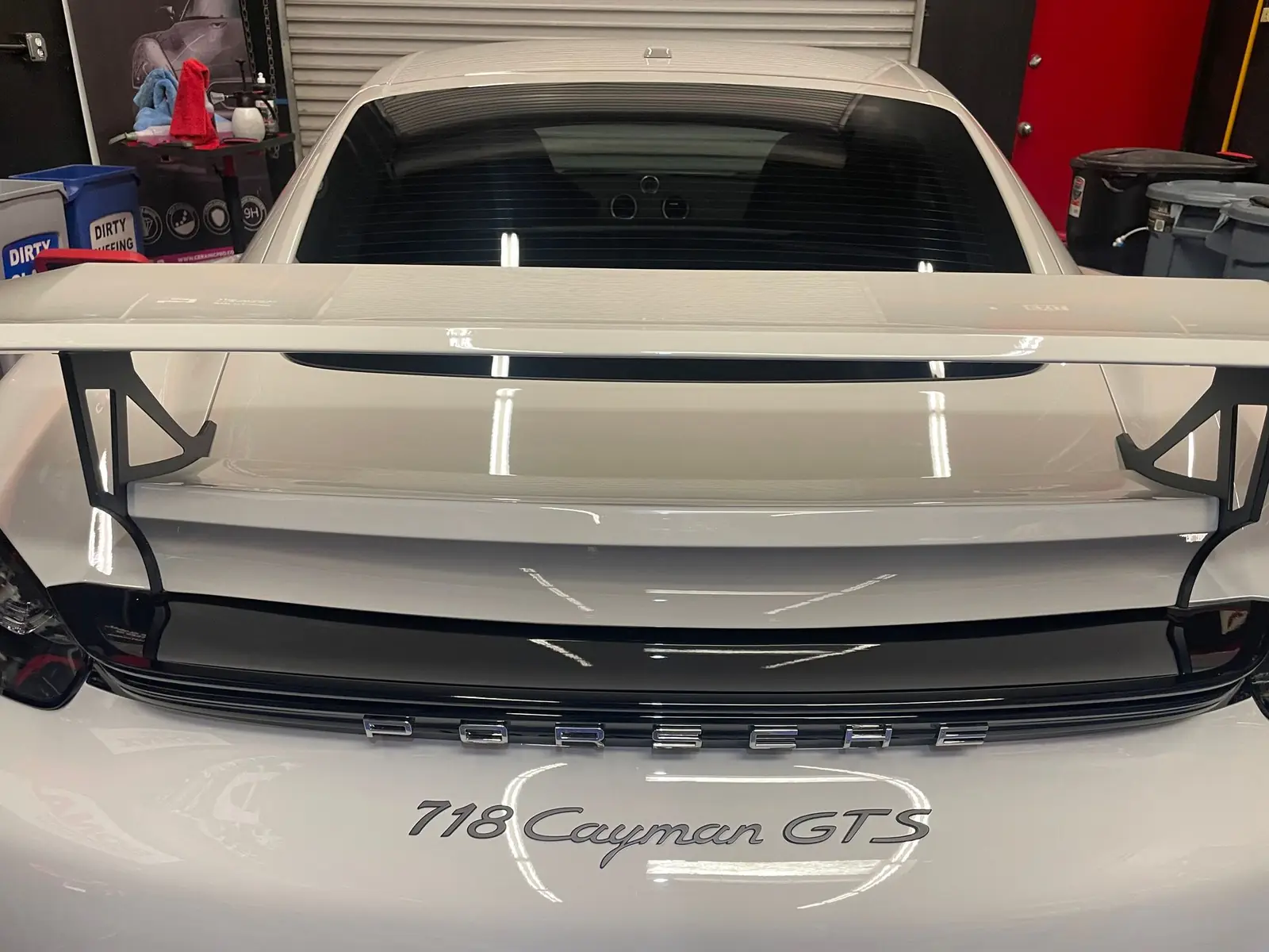 Porsche 718 Cayman GTS rear detailed in the shop