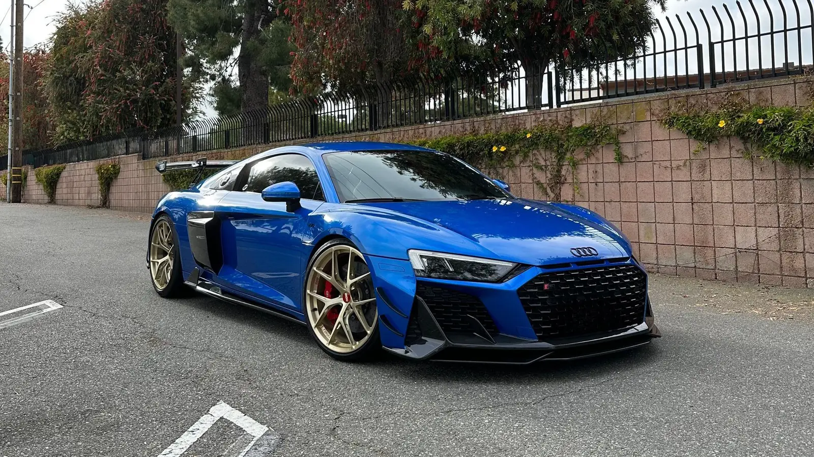Blue Audi R8 with bronze wheels detailed by STRATA Detailing